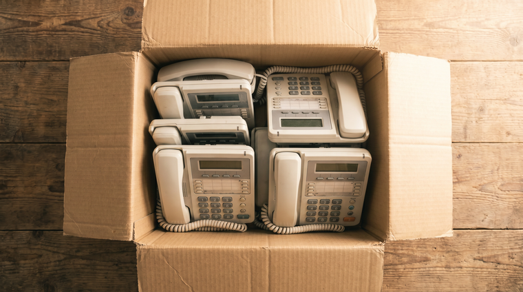 Used office phones boxed for collection - offload used phone systems securely